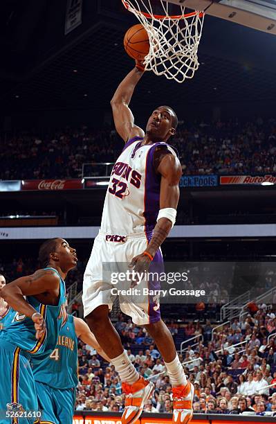 Amare Stoudemire of the Phoenix Suns dunks against the New Orleans Hornets on April 12, 2005 at America West Arena in Phoenix, Arizona. NOTE TO USER:...