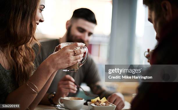 group of friends enjoying coffee - dessert coffee drink stock pictures, royalty-free photos & images