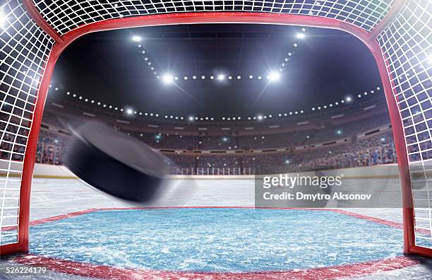 ice hockey goal - hockey puck stock pictures, royalty-free photos & images