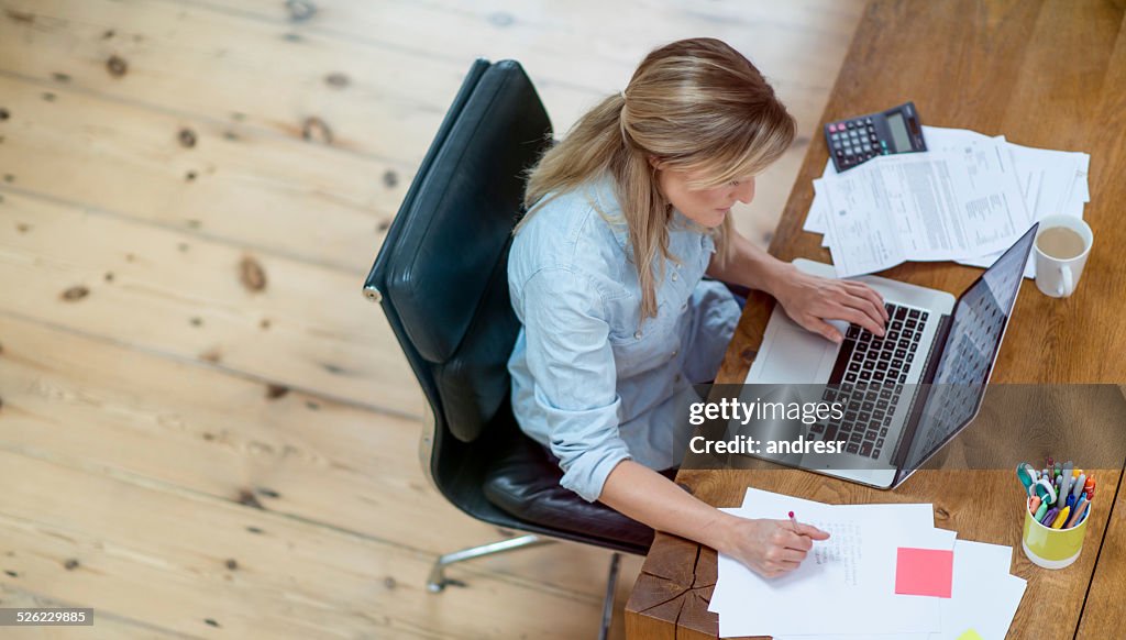 Woman doing her home finances