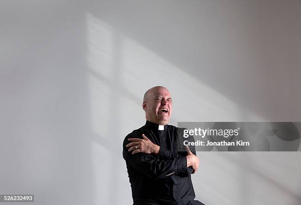 episcopalian priest portrait - priest stock-fotos und bilder