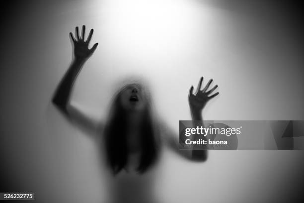 woman silhouette - scary stock pictures, royalty-free photos & images