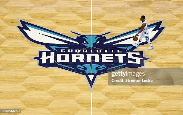 Kemba Walker of the Charlotte Hornets brings the ball up the court against the Miami Heat during game six of the Eastern Conference Quarterfinals of...