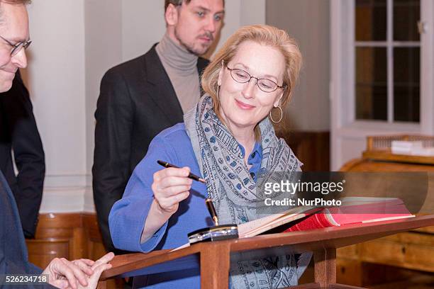 Jury President of the 66th Berlin International Film Festival and Actress Meryl Streep signs the guest book at City Hall in Berlin, Germany on...