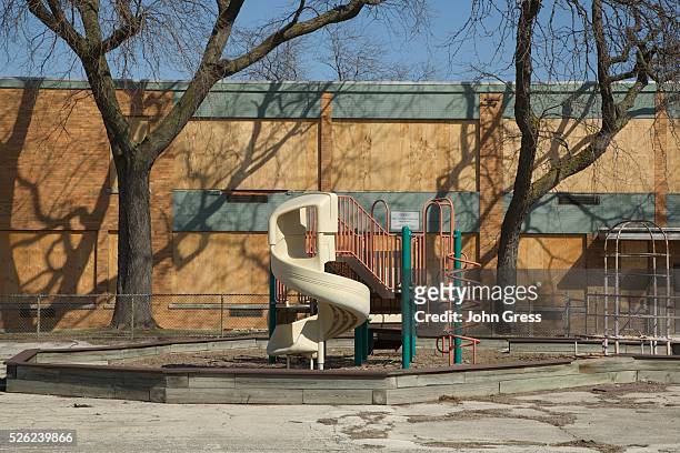 Crispus Attucks Elementary School, which was closed years ago is boarded up in Chicago, Illinois, is closed March 22, 2013. Chicago will close 54...