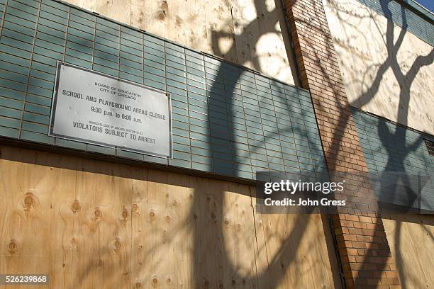 Crispus Attucks Elementary School, which was closed years ago is boarded up in Chicago, Illinois, is closed March 22, 2013. Chicago will close 54...