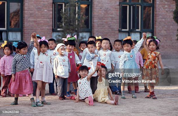 Beijing, China - School children holds Mao Zedong,s Red Book during an essay in Beijing, May 21 1971