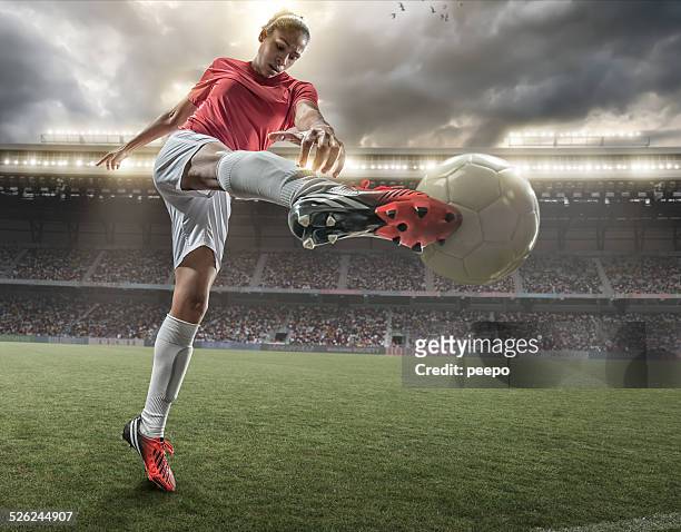 girl playing soccer - football player stock pictures, royalty-free photos & images