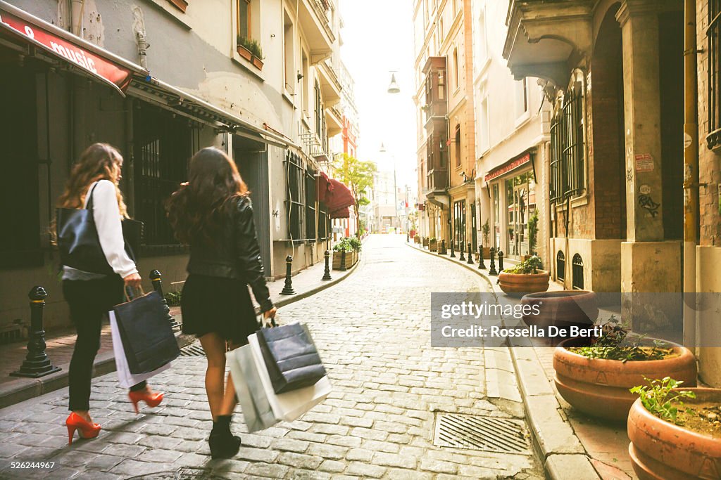 Two Women Hanging Around And Shopping