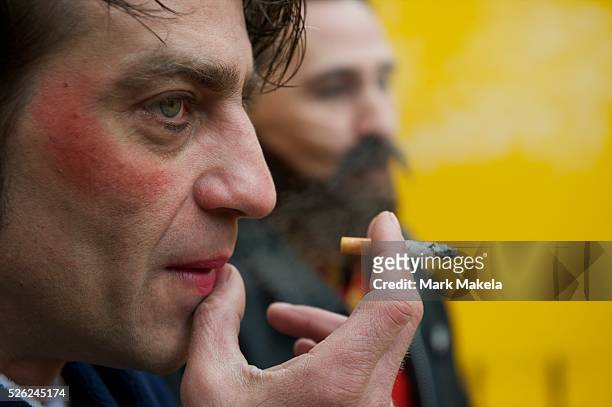 Clown Valery Kashkin and ringmaster Andrey Voronin, performers from the Moscow State Circus, take a smoke break the day before 10 days of consecutive...