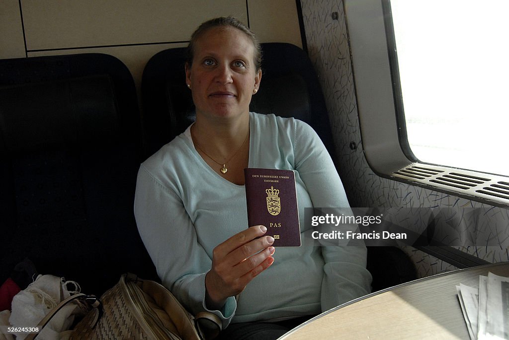 Danes with passport crossing from copenhagen to Malmo sweden