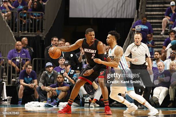 Joe Johnson of the Miami Heat handles the ball against Courtney Lee of the Charlotte Hornets in Game Six of the Eastern Conference Quarterfinals...