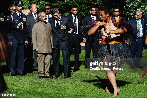 Indian President Shri Pranab Mukherjee is challenged by a Maori warrior during a ceremony of welcome at Government House on April 30, 2016 in...