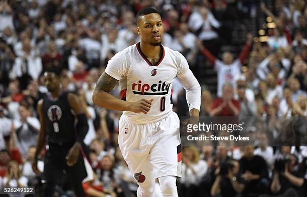 Damian Lillard of the Portland Trail Blazers celebrates after scoring in the first quarter of Game Six of the Western Conference Quarterfinals...