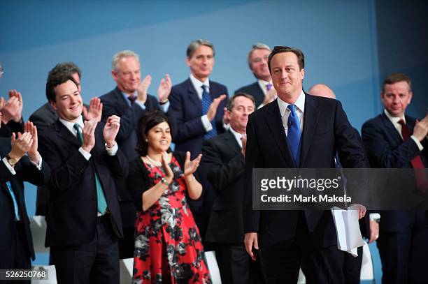 Prime Minister David Cameron takes the stage to delivers his leader's speech on the fourth, and final, day of the Conservatives Party Conference at...