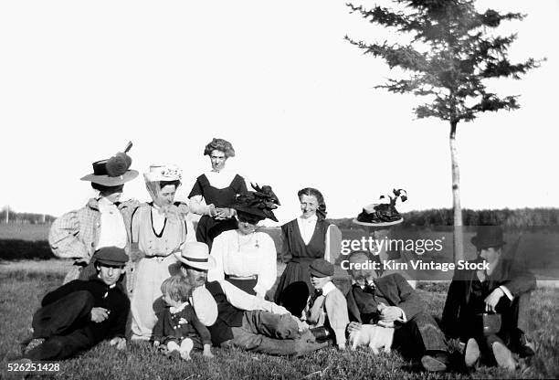 Extended family with child portrait in New York State, USA, ca. 1905