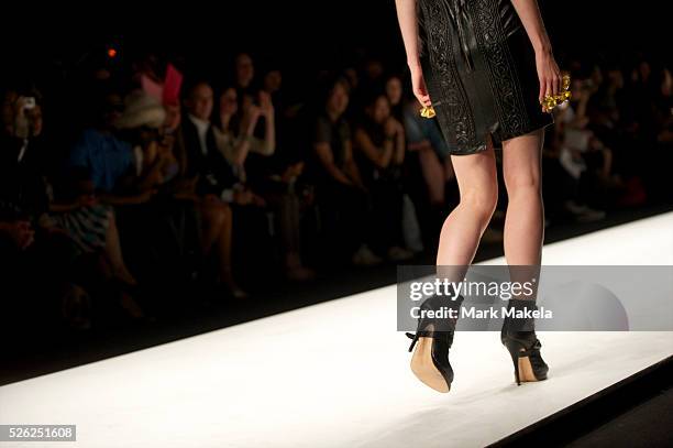 Models show the KTZ spring 2011 collection in the BFC show space at Somerset House, London on 22 September 2010.