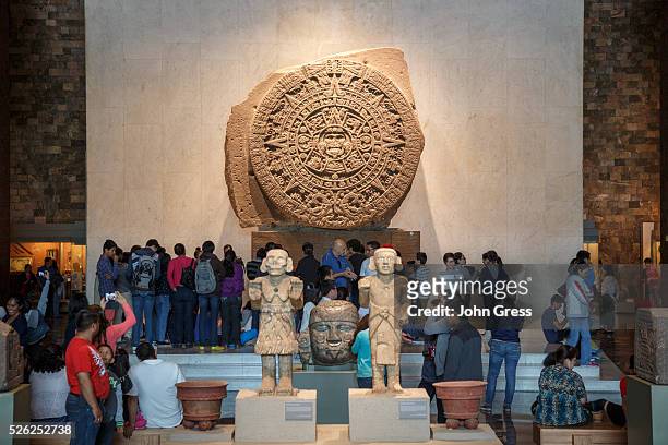 The Aztec calendar is surrounded by tourists at the Museo Nacional de Antropologia in Mexico City, Mexico, September 20, 2015.