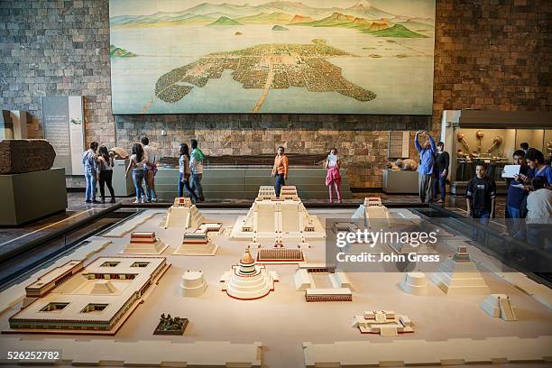 Tourists view Panoramas of the cities of Tenochititlan and Tlatelolco at the Museo Nacional de Antropologia in Mexico City, Mexico, September 20,...