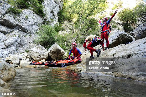 Firemen of GRIMP 66, "Groupe de Reconnaissance et d'Intervention en Milieu Perilleux" , during a rescue exercise in a canyon in the Gorges of Galamus.