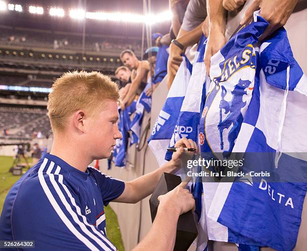 Chelsea FC player Kevin De Bruyne signs autographs after the Guinness International Champions Cup match between AC Milan and Chelsea FC. Chelsea FC...