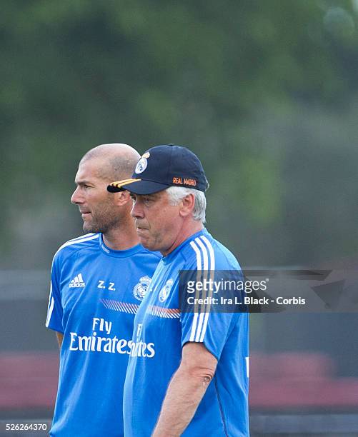 Real Madrid Head Coach Carlo Ancelotti and Zinedine Zidane during practices prior to the Championship match between Chelsea FC and Real Madrid during...