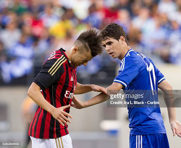 Milan player Stephan El Shaarawy reacts to a hit by Oscar during the Guinness International Champions Cup match between AC Milan and Chelsea FC....