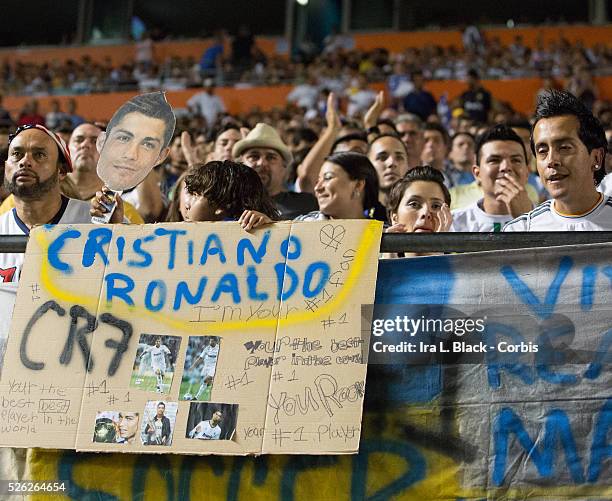 Fans hold up signs for Cristiano Ronaldo during the Championship match between Chelsea FC and Real Madrid during the Guinness International Champions...