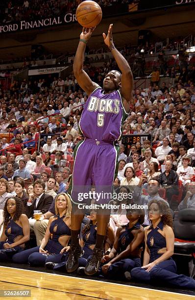 Anthony Goldwire#5 of the Milwaukee Bucks takes a jump shot against the Miami Heat during NBA action on March 14, 2005 at American Airlines Arena in...