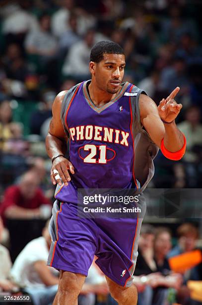 Jim Jackson of the Phoenix Suns gestures during the game against the Charlotte Bobcats at Charlotte Coliseum on March 23, 2005 in Charlotte, North...