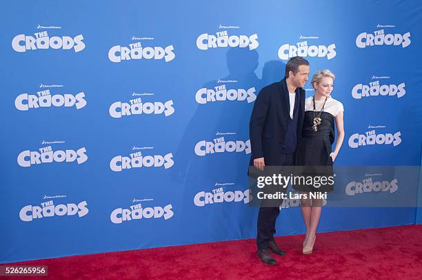 Ryan Reynolds and Emma Stone attend The Croods film premiere at the AMC Loews Lincoln Square in New York City. �� LAN