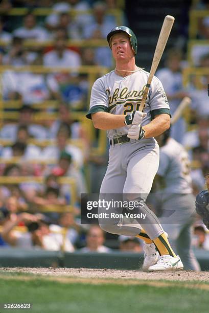 Mark McGwire of the Oakland Athletics bats during a season game. Mark McGwire played for the Oakland Athletics from1986-1997.