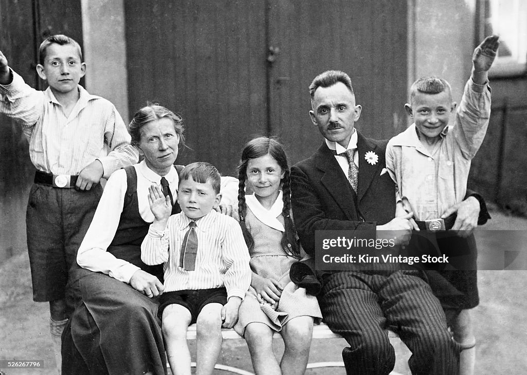 Boys in family demostrate Nazi salute, ca. 1937