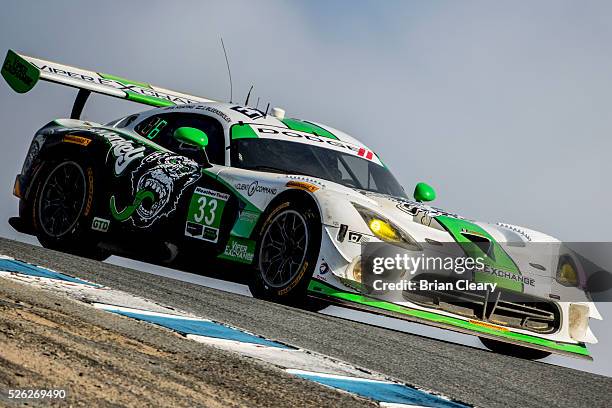 The Dodge Viper GT3-R of Ben Keating and Jeroen Bleekemolen races on the track during practice for the Continental Monterey Grand Prix IMSA...