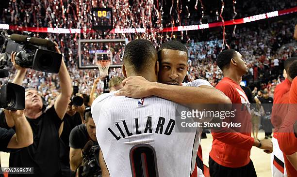 Damian Lillard and C.J. McCollum of the Portland Trail Blazers celebrate after winning Game Six of the Western Conference Quarterfinals against the...