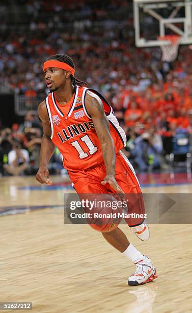 Dee Brown of the University of Illinois Fighting Illini drives against the University of North Carolina Tar Heels during the NCAA Men's National...