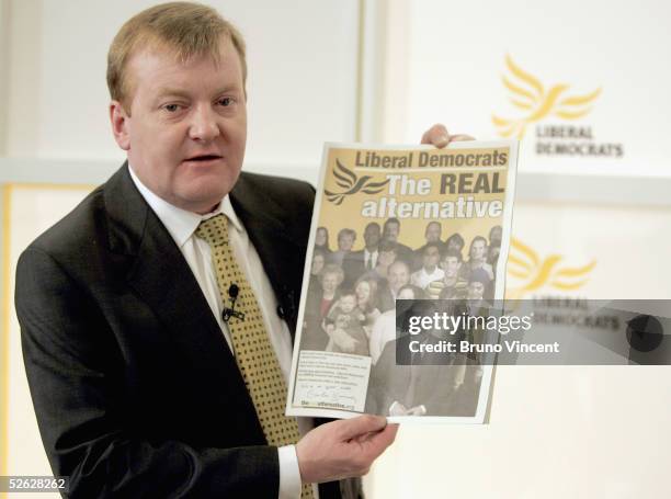 Leader of the Liberal Democrats Charles Kennedy poses with a copy of the party's manifesto, April 14, 2005 in London. Mr Kennedy will today return to...