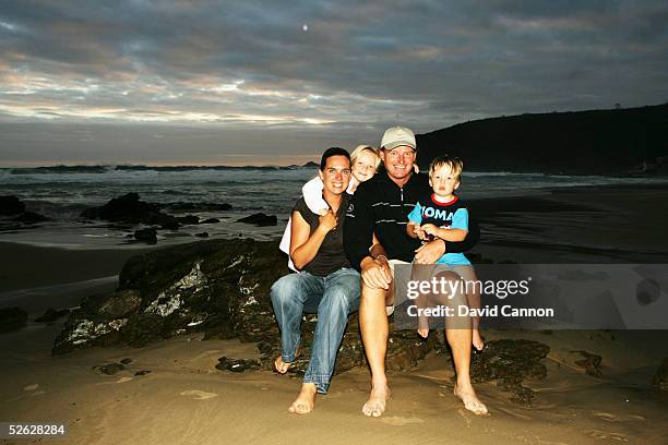 Ernie Els of South Africa with is wife Liesl, and children Samantha, and Ben on the beach in Herold's Bay, on February 25 in Herold's Bay, South...