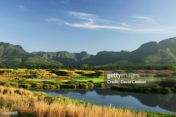 The green looking towards the mountains on the 425 metre par 4, 15th hole on the Links Course at Fancourt, on February 25 in George, South Africa.