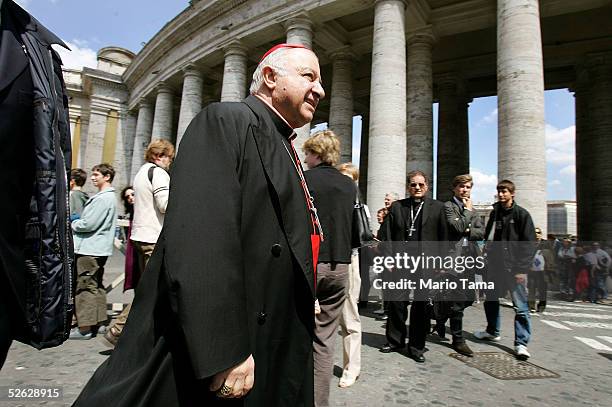 Italian Cardinal Dionigi Tettamanzi smiles as he leaves the meeting to prepare the next conclave at the Synod Hall on April 14, 2005 in Rome, Italy....