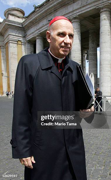 Italian Cardinal Severino Poletto, Archbishop of Turin, leaves the meeting to prepare the next conclave at the Synod Hall on April 14, 2005 in Rome,...