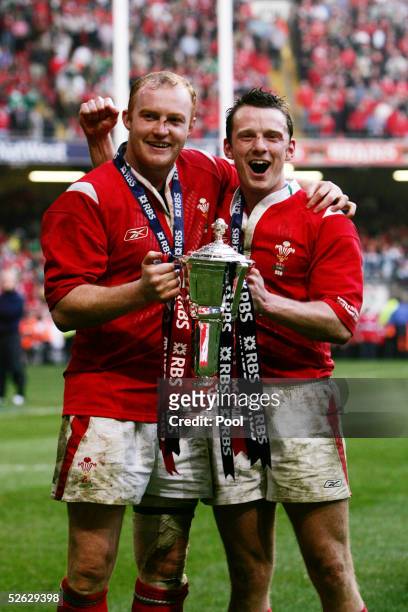Martyn Williams and Kevin Morgan of Wales celebrate with the Trophy during the RBS Six Nations International between Wales and Ireland at The...