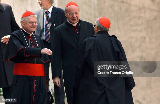 Archbishop of Venice Cardinal Angelo Scola and Austrian Cardinal Christoph Schoenborn talk after they left the meeting to prepare the next conclave...