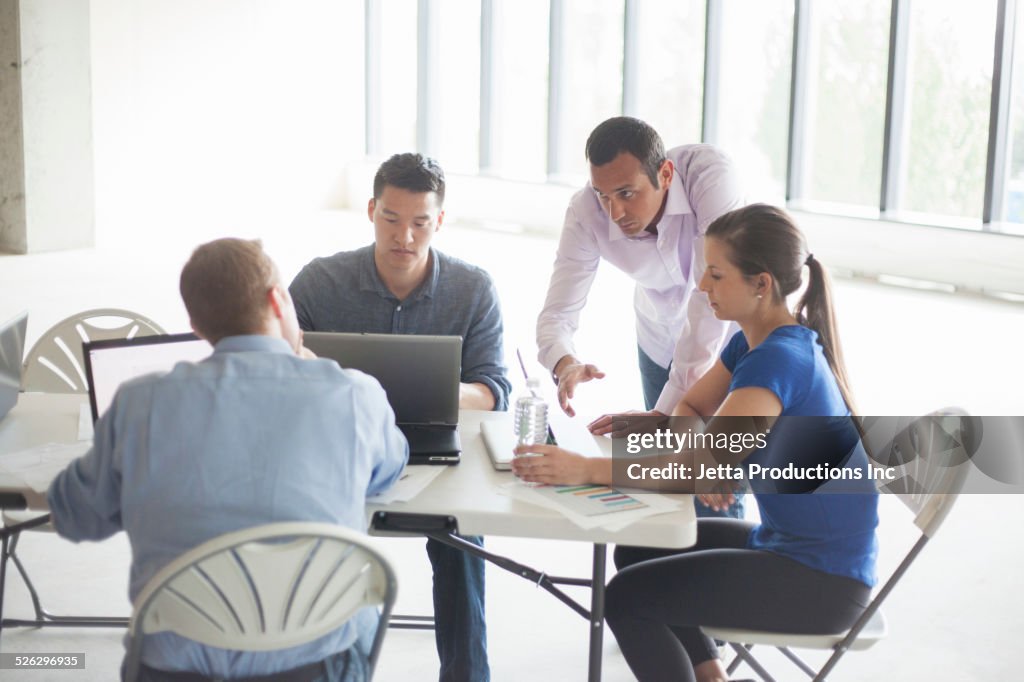 Business people talking in meeting