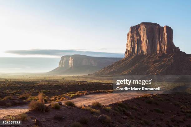 rock formations overlooking desert landscape, monument valley, utah, united states - monument valley stock pictures, royalty-free photos & images