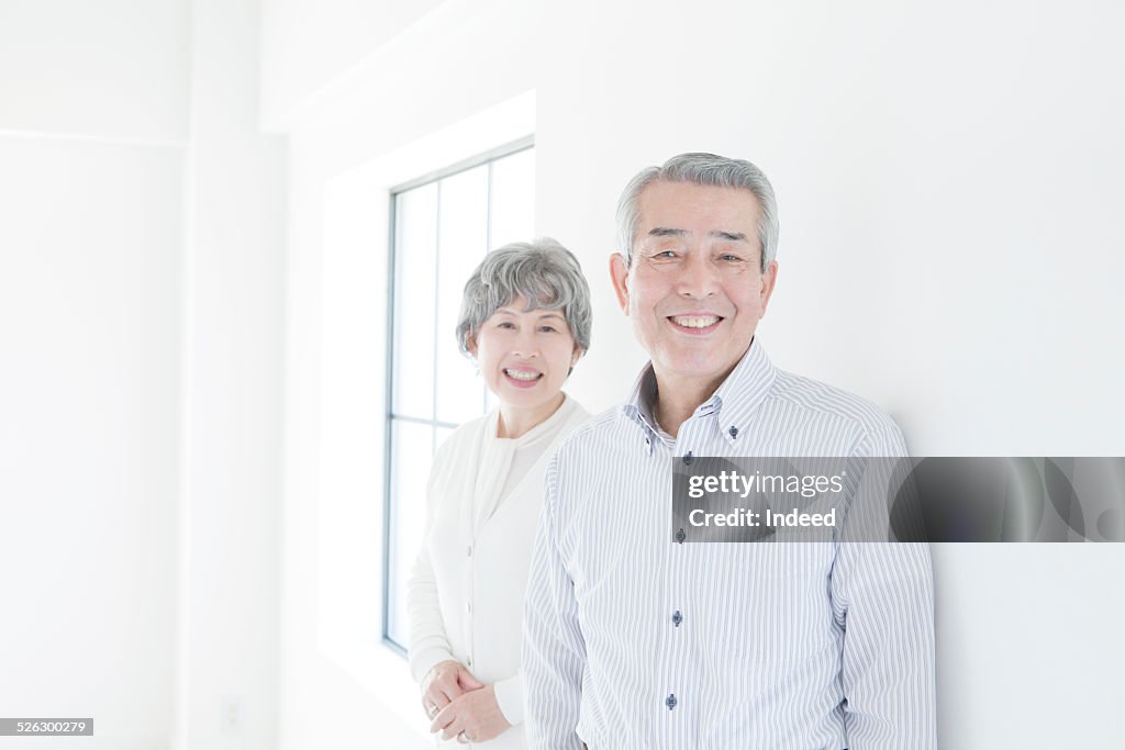 A senior couple making a pose