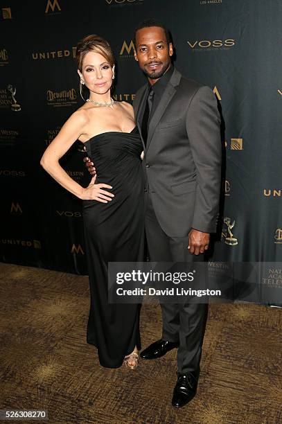 Actress Lisa LoCicero and actor Anthony Montgomery pose in the press room at the 43rd Annual Daytime Creative Arts Emmy Awards at Westin Bonaventure...