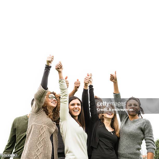 multiracial adult - thumbs up - friends with white background stockfoto's en -beelden