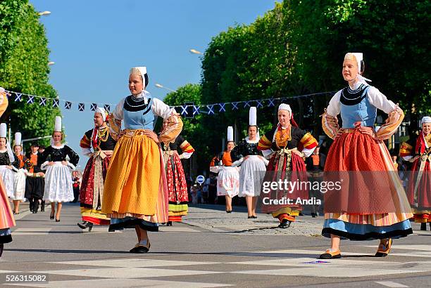 Dancers from the Celtic circle dance group Ar Vro Vigouden from Pont-Labbe attending the Grand Parade of Celtic Nations of the "Festival...