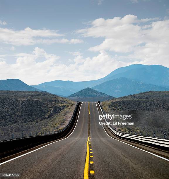 two lane highway - nevada road stock pictures, royalty-free photos & images